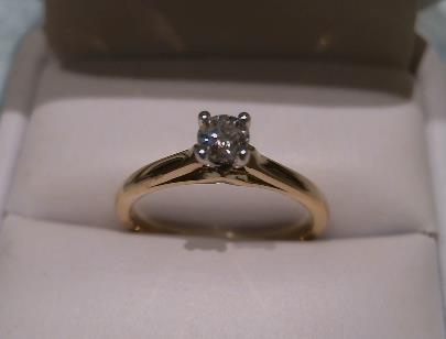 Yellow gold solitaire Canadian diamond ring