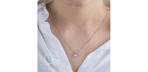 Lab created dancing diamond heart pendant
