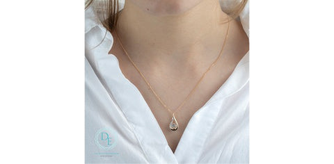 Lab created dancing diamond pendant