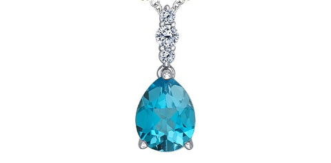 Maple Leaf Canadian diamond pendant with a blue topaz