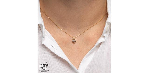 10 karat yellow gold dancing diamond pendant