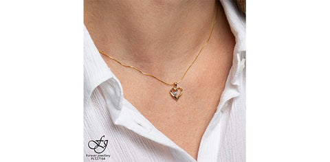 Yellow gold diamond heart pendant