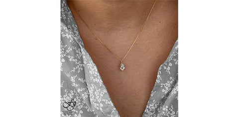 10KY WHITE TOPAZ PEND