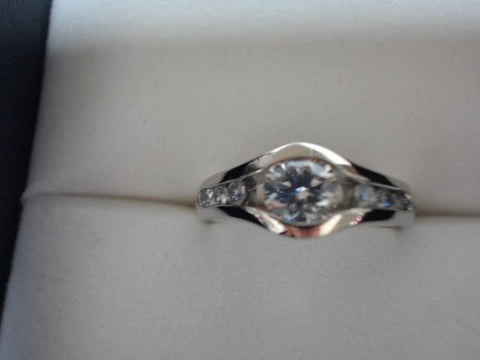 14K WHITE GOLD ENGAGEMENT RING WITH A .50 CENTER DIAMOND